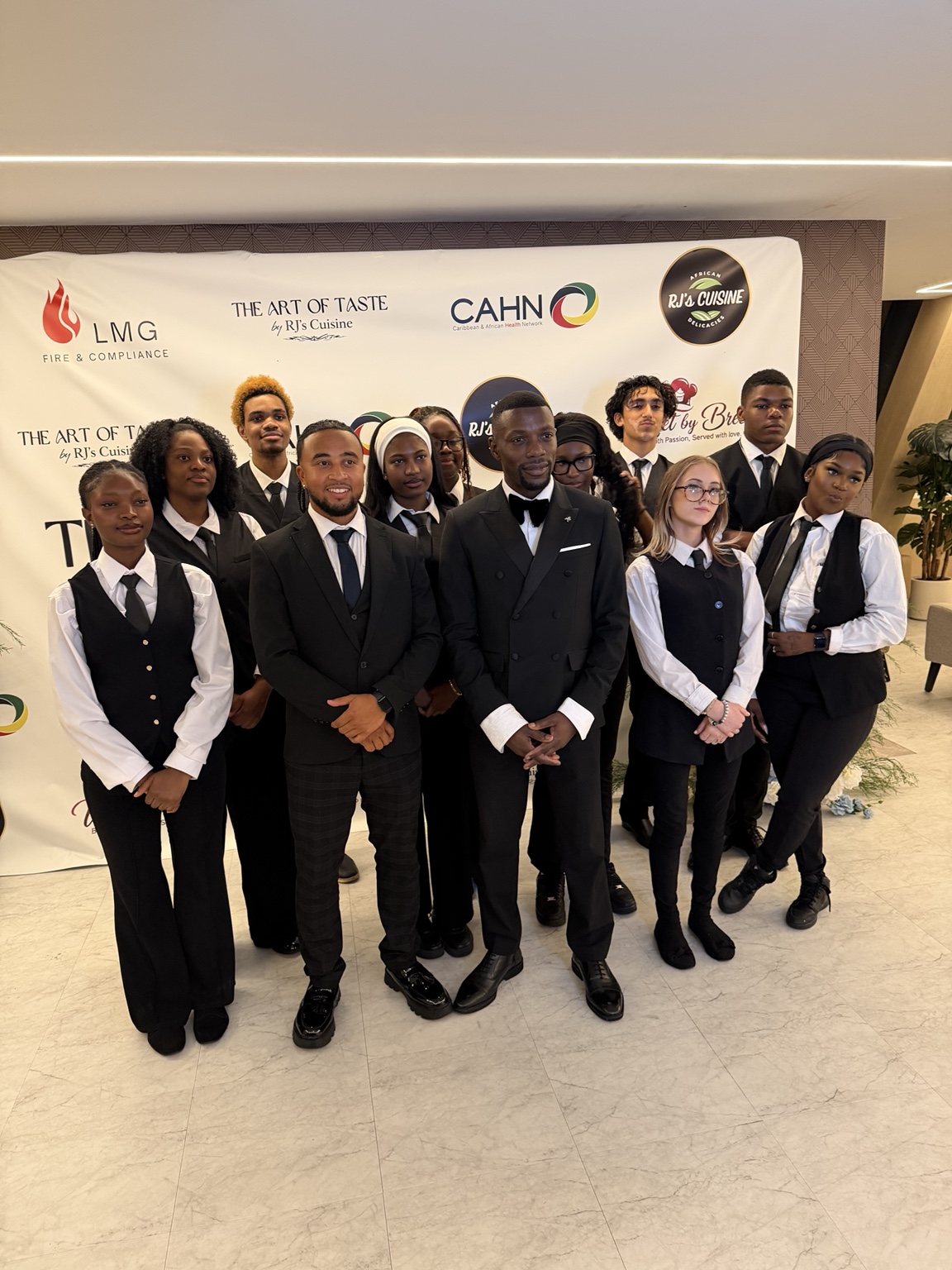 OWC hospitality team dressed professionally at an event